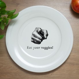 White plate with a pointing hand illustration and the text 'Eat your veggies!'