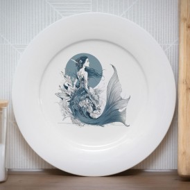 White plate with an illustration of a mermaid emerging from ocean waves
